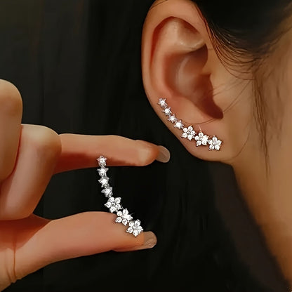 Des boucles d'oreilles fleuries intemporelles