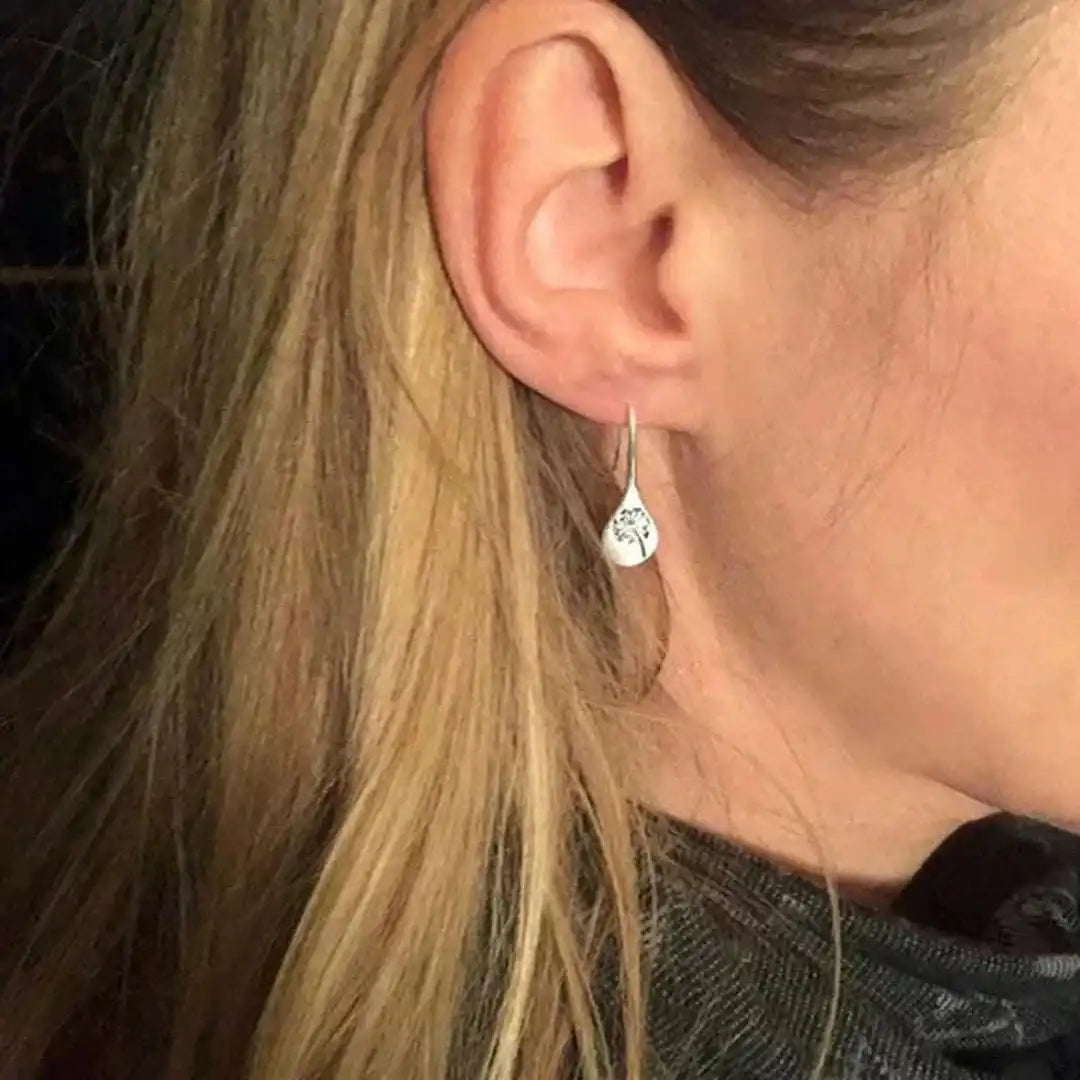 Boucles d'oreilles vintage en argent, délicatement sculptées en forme de fleur