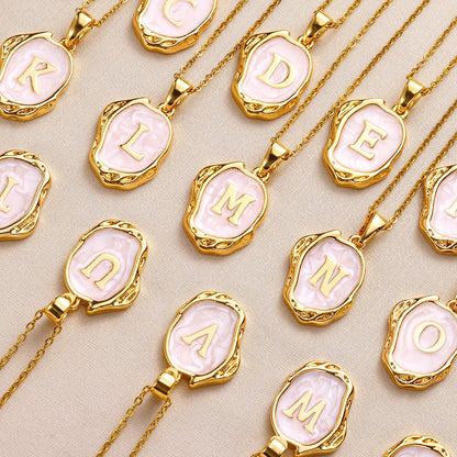 Collier océan plaqué or 18 carats avec initiales au fond de la mer