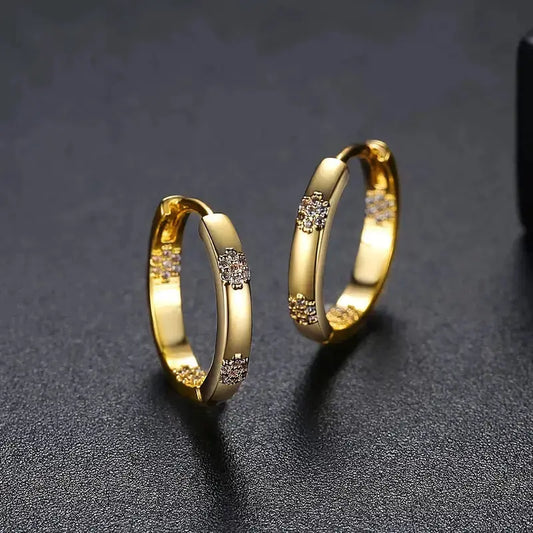 Boucles d'oreilles vintage en forme de cercle ornées d'une fleur dorée