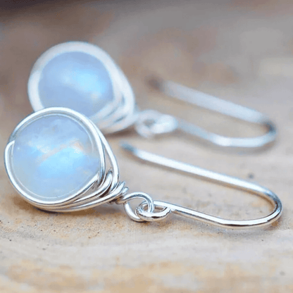Boucles d'oreilles pendantes en argent et pierre de lune