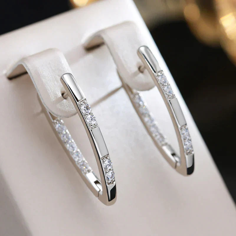Élégantes boucles d'oreilles en zirconium et or