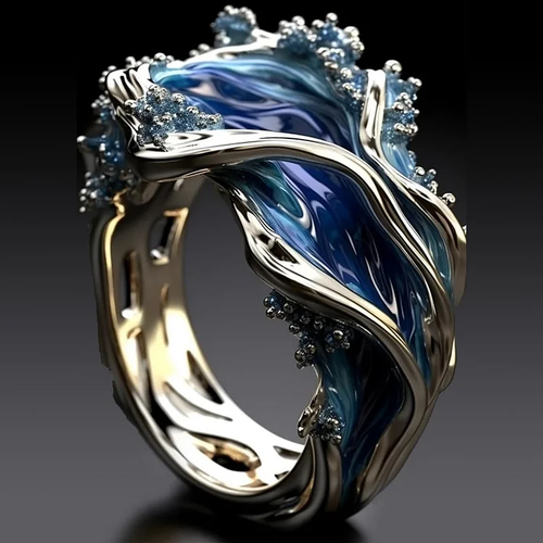 Bague vintage en or au motif de vagues marines