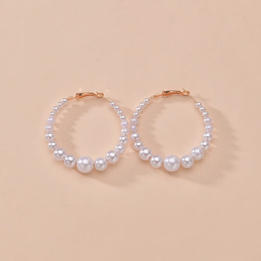 Boucles d'oreilles en argent massif faites à la main avec des perles d'eau douce naturelles